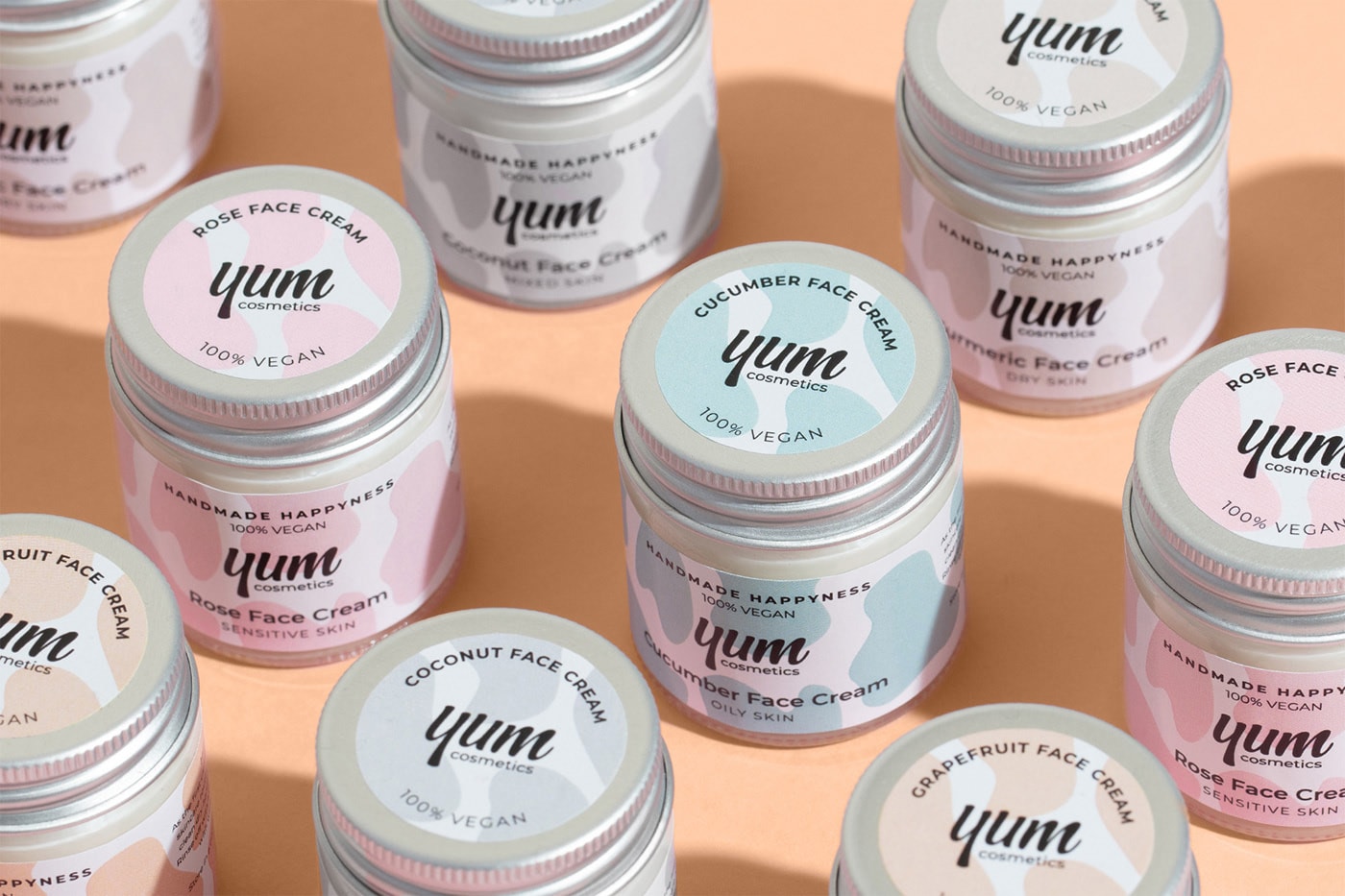 Yum高级手工零售化妆品精品店品牌VI设计，化妆品VI设计，高端VI设计，品牌视觉设计，深圳VI设计，左右格局